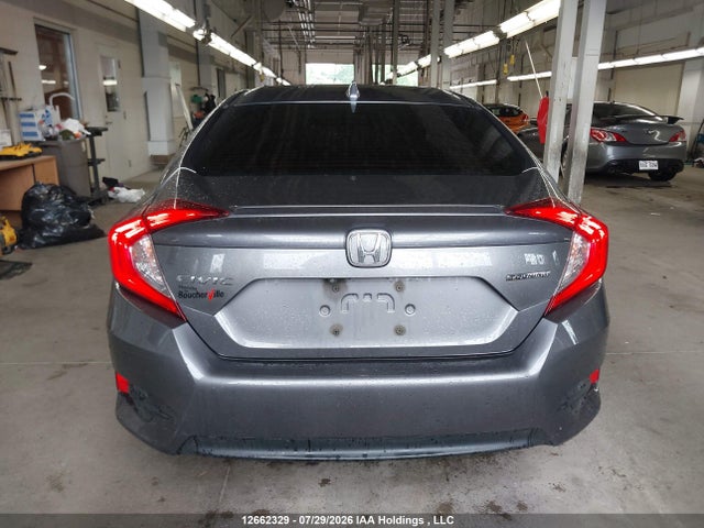 Auction sale of the 2017 Honda Civic Touring, vin: 2HGFC1F92HH110280, lot number: 12662329