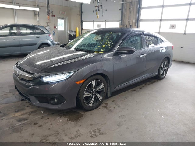 Auction sale of the 2017 Honda Civic Touring, vin: 2HGFC1F92HH110280, lot number: 12662329