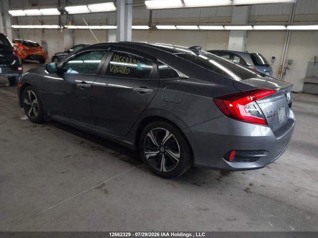 Auction sale of the 2017 Honda Civic Touring, vin: 2HGFC1F92HH110280, lot number: 12662329