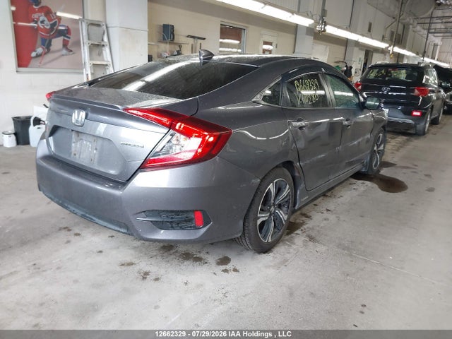 Auction sale of the 2017 Honda Civic Touring, vin: 2HGFC1F92HH110280, lot number: 12662329