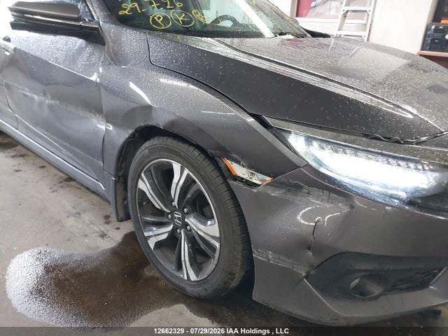 Auction sale of the 2017 Honda Civic Touring, vin: 2HGFC1F92HH110280, lot number: 12662329