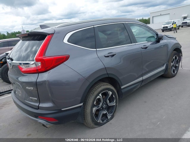 2018 Honda Cr-v Touring მანქანა იყიდება აუქციონზე, vin: 2HKRW2H9XJH114662, აუქციონის ნომერი: 12629340