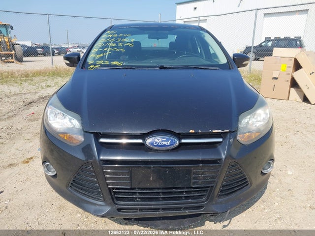 Продаж на аукціоні авто 2012 Ford Focus Titanium, vin: 1FAHP3J23CL142576, номер лоту: 12663123