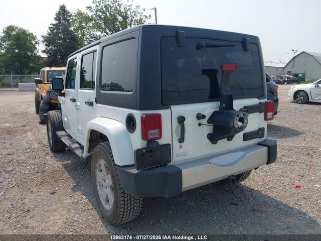 Auction sale of the 2011 Jeep Wrangler Unlimited Sahara, vin: 1J4BA5H15BL555165, lot number: 12663174