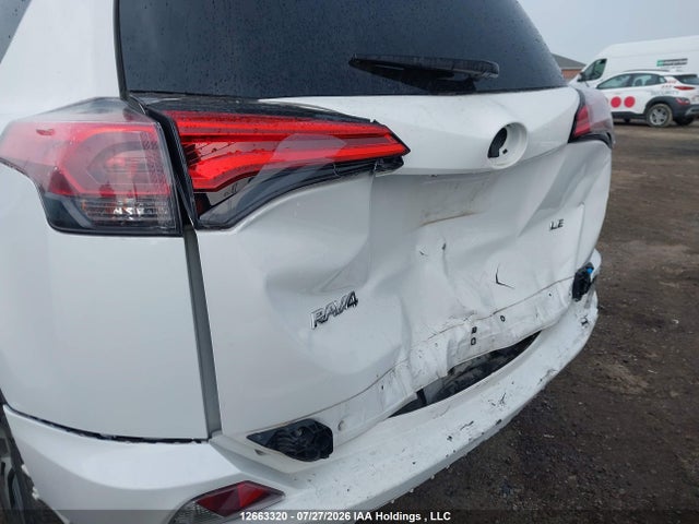2018 Toyota Rav4 Le მანქანა იყიდება აუქციონზე, vin: 2T3ZFREV6JW502135, აუქციონის ნომერი: 12663320