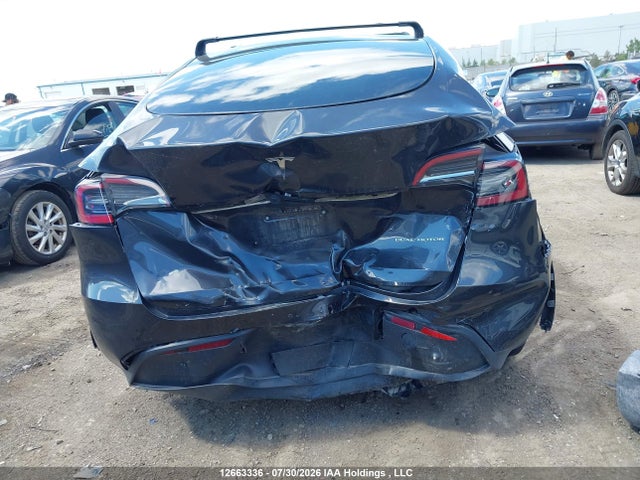 Auction sale of the 2025 Tesla Model Y Long Range, vin: 7SAYGDEE4SF295783, lot number: 12663336