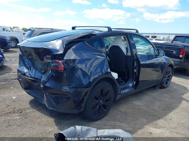 Auction sale of the 2025 Tesla Model Y Long Range, vin: 7SAYGDEE4SF295783, lot number: 12663336