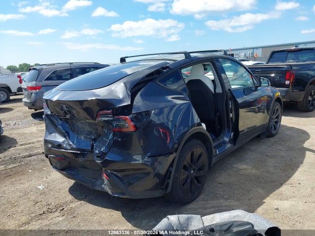 Auction sale of the 2025 Tesla Model Y Long Range, vin: 7SAYGDEE4SF295783, lot number: 12663336