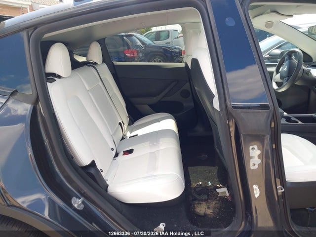 Auction sale of the 2025 Tesla Model Y Long Range, vin: 7SAYGDEE4SF295783, lot number: 12663336