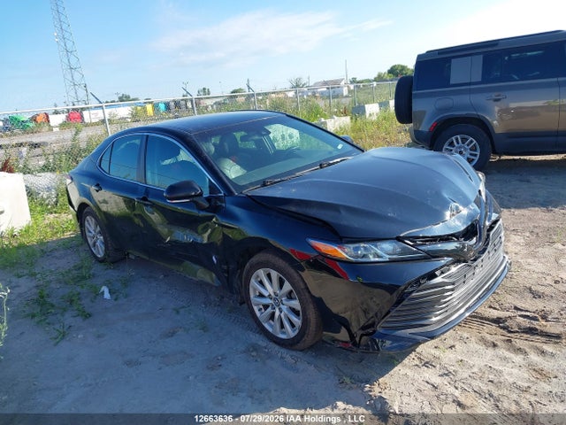 Auction sale of the 2018 Toyota Camry Hybrid, vin: 4T1B31HK0JU003742, lot number: 12663636
