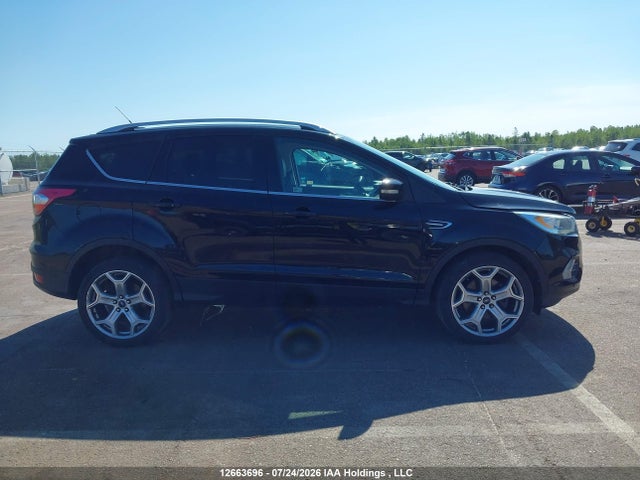 Продаж на аукціоні авто 2017 Ford Escape Titanium, vin: 1FMCU9J99HUA33601, номер лоту: 12663696