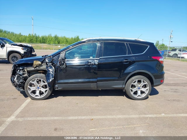 Продаж на аукціоні авто 2017 Ford Escape Titanium, vin: 1FMCU9J99HUA33601, номер лоту: 12663696