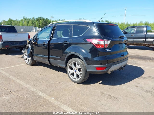 Продаж на аукціоні авто 2017 Ford Escape Titanium, vin: 1FMCU9J99HUA33601, номер лоту: 12663696