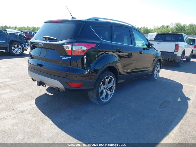 Продаж на аукціоні авто 2017 Ford Escape Titanium, vin: 1FMCU9J99HUA33601, номер лоту: 12663696