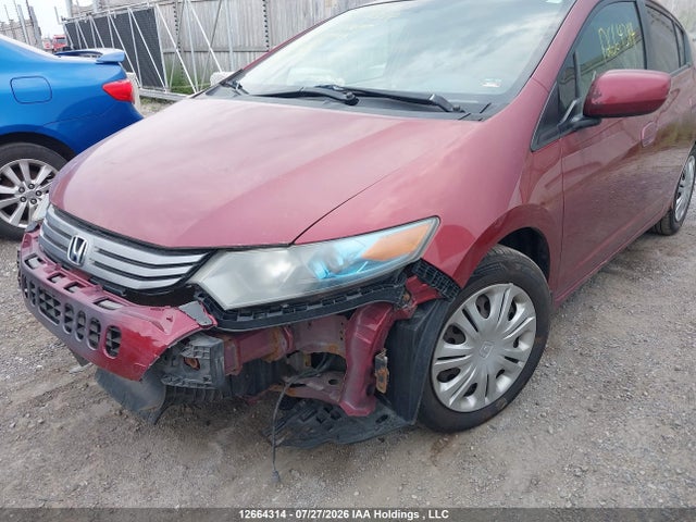 Продажа на аукционе авто 2010 Honda Insight Lx, vin: JHMZE2H54AS800499, номер лота: 12664314