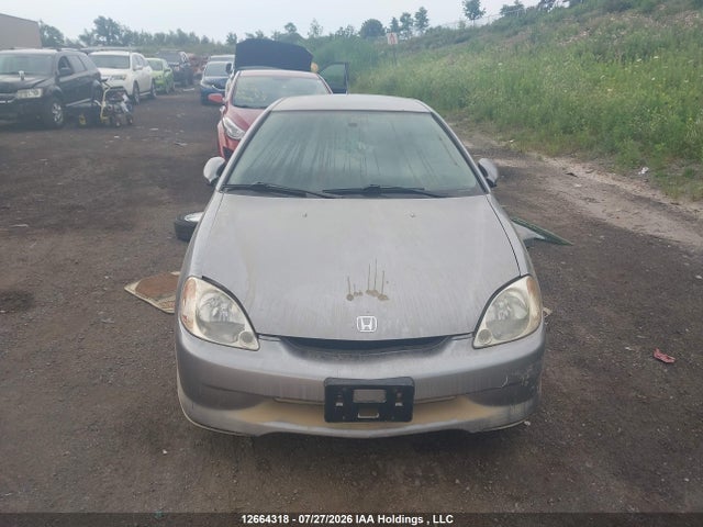 Продажа на аукционе авто 2000 Honda Insight, vin: JHMZE1372YT800119, номер лота: 12664318