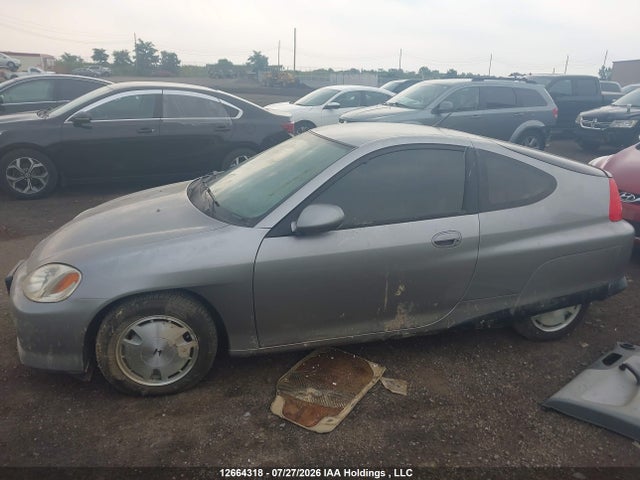 Продажа на аукционе авто 2000 Honda Insight, vin: JHMZE1372YT800119, номер лота: 12664318