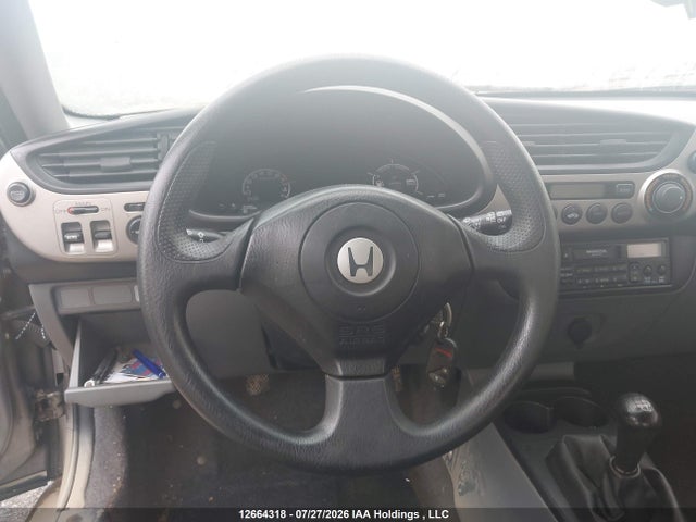 Продажа на аукционе авто 2000 Honda Insight, vin: JHMZE1372YT800119, номер лота: 12664318