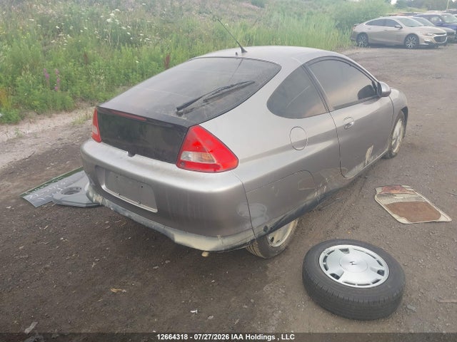 Продажа на аукционе авто 2000 Honda Insight, vin: JHMZE1372YT800119, номер лота: 12664318
