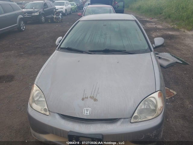 Продажа на аукционе авто 2000 Honda Insight, vin: JHMZE1372YT800119, номер лота: 12664318