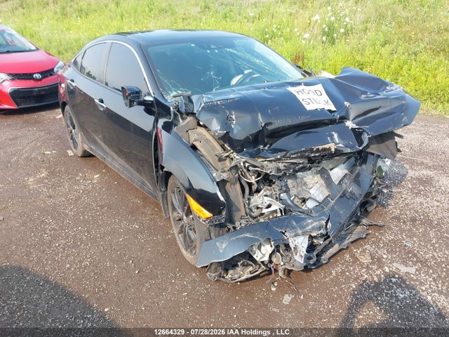 Honda Civic Touring 2018 2HGFC1F91JH107568 главное изображение
