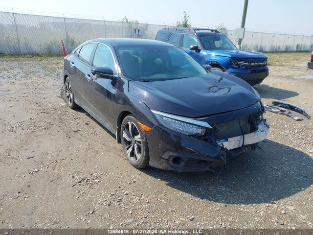 2017 Honda Civic Touring მანქანა იყიდება აუქციონზე, vin: 2HGFC1F91HH103126, აუქციონის ნომერი: 12664616
