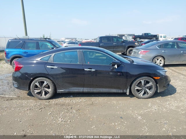 Auction sale of the 2017 Honda Civic Touring, vin: 2HGFC1F91HH103126, lot number: 12664616