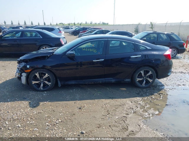 Auction sale of the 2017 Honda Civic Touring, vin: 2HGFC1F91HH103126, lot number: 12664616