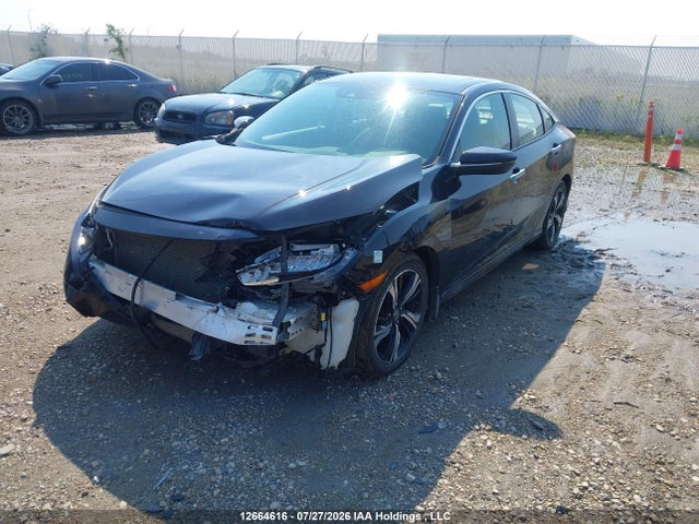 Auction sale of the 2017 Honda Civic Touring, vin: 2HGFC1F91HH103126, lot number: 12664616