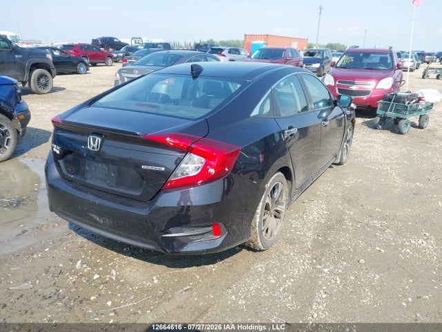Auction sale of the 2017 Honda Civic Touring, vin: 2HGFC1F91HH103126, lot number: 12664616