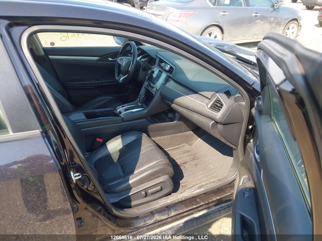Auction sale of the 2017 Honda Civic Touring, vin: 2HGFC1F91HH103126, lot number: 12664616