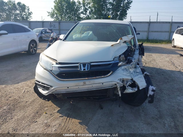 2HKRM4H42FH130349 Honda CR-V SE