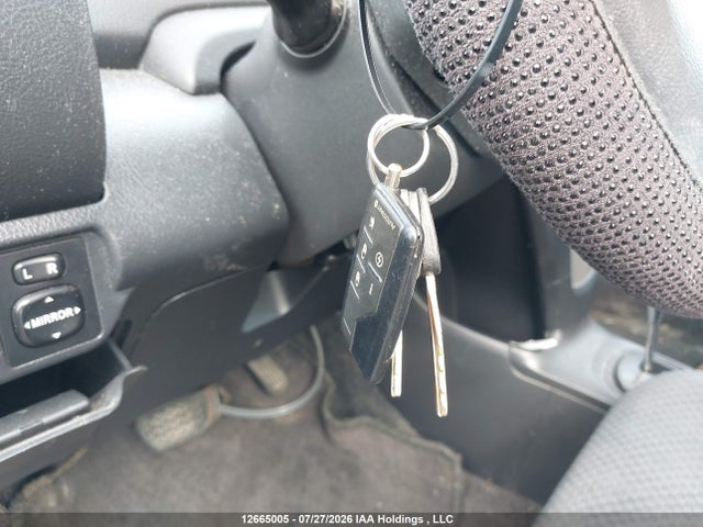 12665005 :رقم المزاد ، JTDBT923871131855 vin ، 2007 Toyota Yaris مزاد بيع
