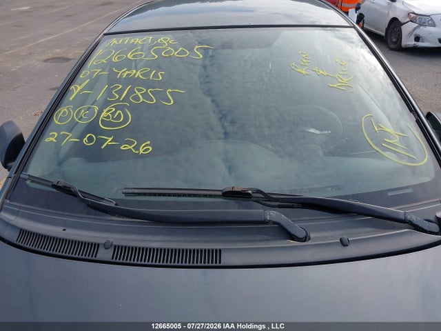 12665005 :رقم المزاد ، JTDBT923871131855 vin ، 2007 Toyota Yaris مزاد بيع
