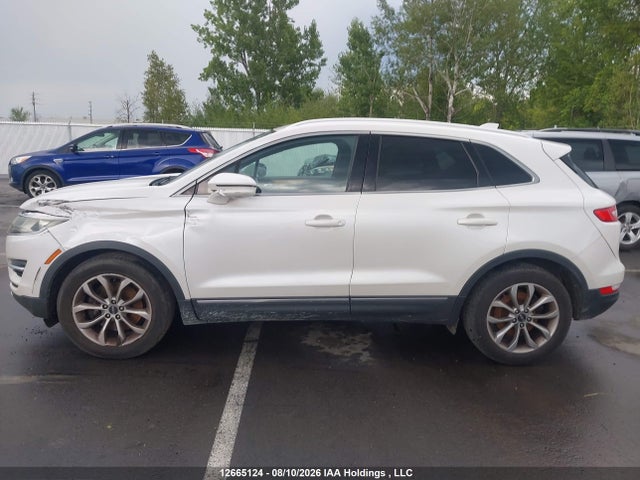 12665124 :رقم المزاد ، 5LMCJ2A97FUJ10489 vin ، 2015 Lincoln Mkc مزاد بيع
