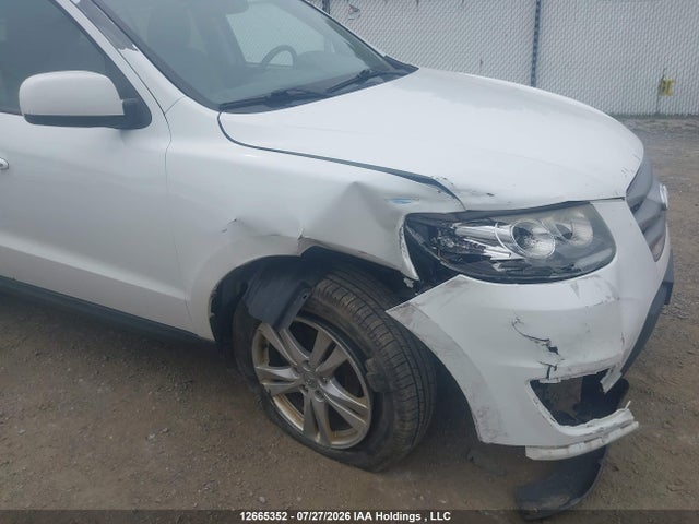 Продажа на аукционе авто 2012 Hyundai Santa Fe Se, vin: 5XYZHDAG1CG138003, номер лота: 12665352
