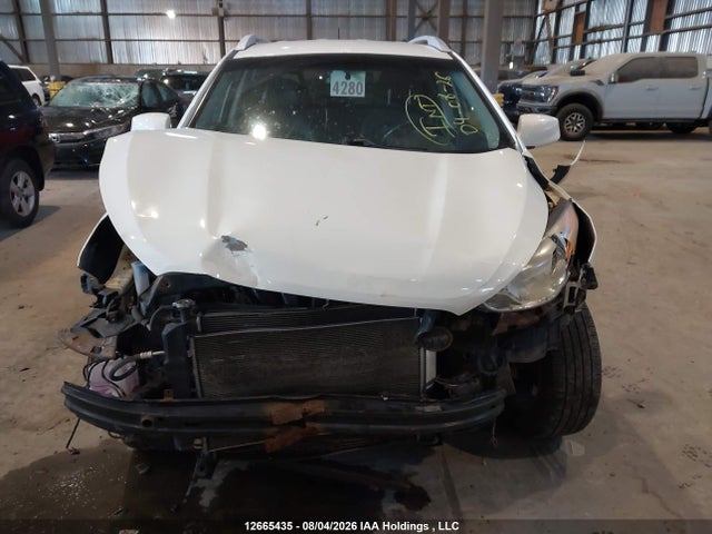 12665435 :رقم المزاد ، KM8JU3AC4CU394520 vin ، 2012 Hyundai Tucson Gls/limited مزاد بيع