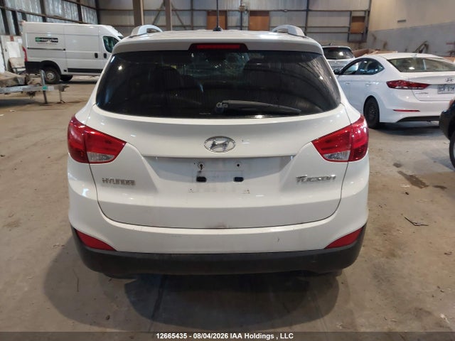 12665435 :رقم المزاد ، KM8JU3AC4CU394520 vin ، 2012 Hyundai Tucson Gls/limited مزاد بيع