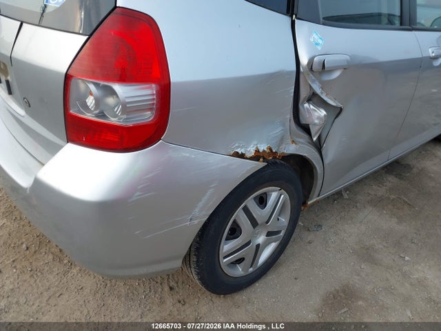 12665703 :رقم المزاد ، JHMGD38407S817204 vin ، 2007 Honda Fit مزاد بيع