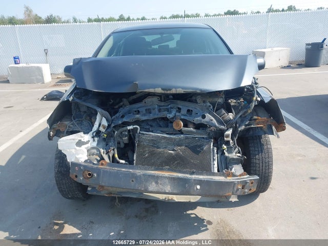 12665729 :رقم المزاد ، JTDBT923881215689 vin ، 2008 Toyota Yaris مزاد بيع