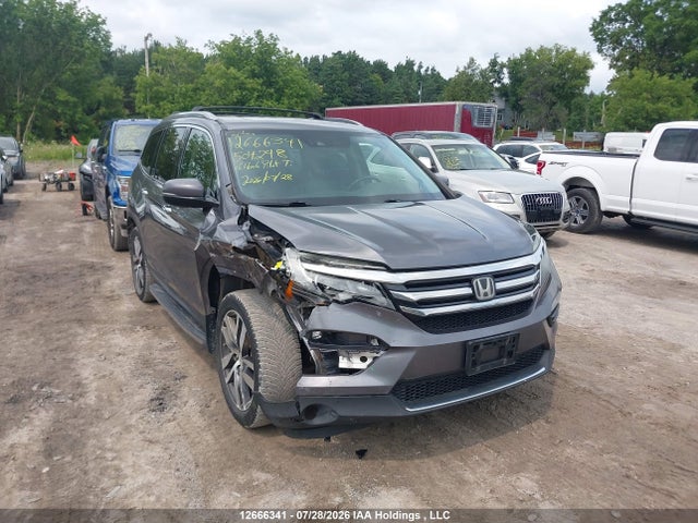 Honda Pilot Touring 2016 5FNYF6H98GB504248 главное изображение
