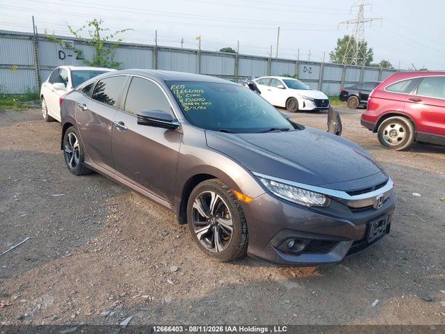 Honda Civic Touring 2016 2HGFC1F97GH101640 zdjęcie główne