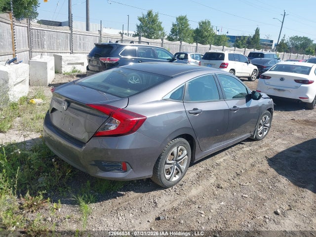 12666534 :رقم المزاد ، 2HGFC2F52JH036111 vin ، 2018 Honda Civic Lx مزاد بيع