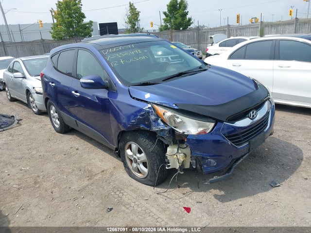 12667091 :رقم المزاد ، KM8JUCAC5CU350493 vin ، 2012 Hyundai Tucson Limited مزاد بيع