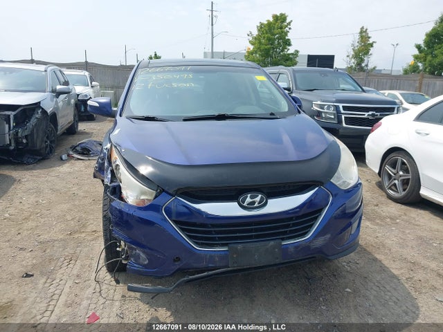 12667091 :رقم المزاد ، KM8JUCAC5CU350493 vin ، 2012 Hyundai Tucson Limited مزاد بيع