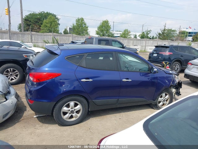 12667091 :رقم المزاد ، KM8JUCAC5CU350493 vin ، 2012 Hyundai Tucson Limited مزاد بيع