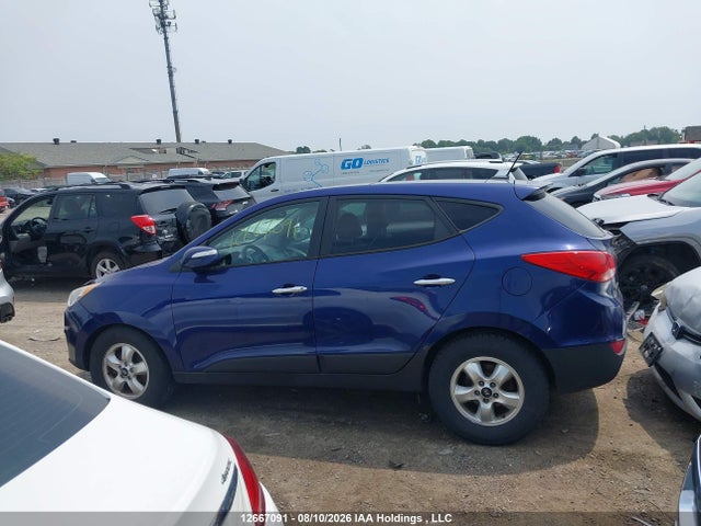 12667091 :رقم المزاد ، KM8JUCAC5CU350493 vin ، 2012 Hyundai Tucson Limited مزاد بيع