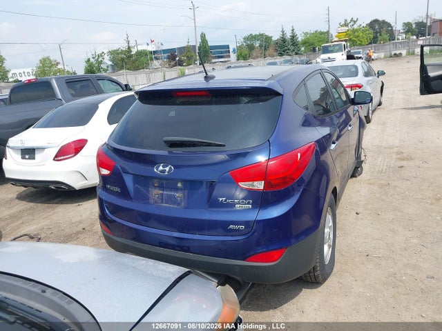 12667091 :رقم المزاد ، KM8JUCAC5CU350493 vin ، 2012 Hyundai Tucson Limited مزاد بيع