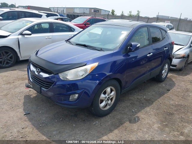 12667091 :رقم المزاد ، KM8JUCAC5CU350493 vin ، 2012 Hyundai Tucson Limited مزاد بيع