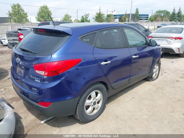 12667091 :رقم المزاد ، KM8JUCAC5CU350493 vin ، 2012 Hyundai Tucson Limited مزاد بيع